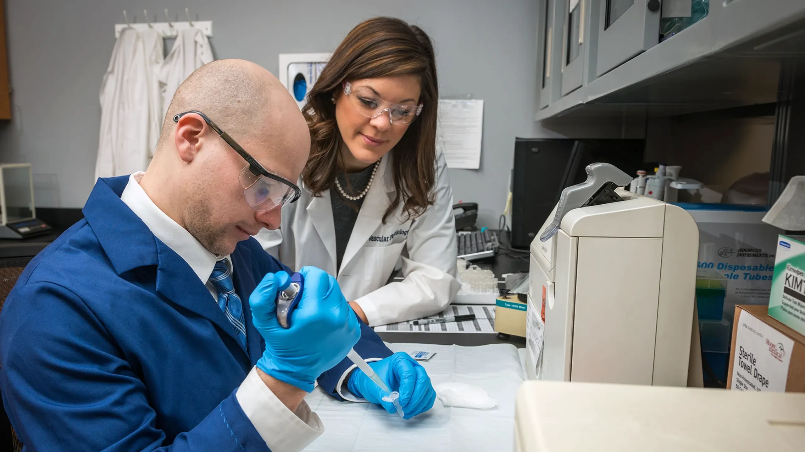 Scientists  Working with Test Tube 